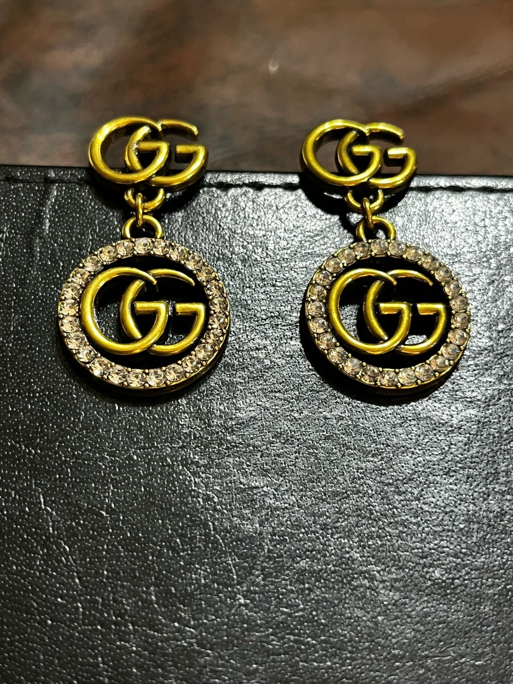 Gucci. Letter Logo Rhinestone Brushed Gold Dangle Earrings